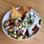 Greek turkey meatballs served with tzatziki, cucumber, tomato, red onion, feta, and naan chips.